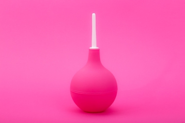 73511749 - pink enema on a pink background
